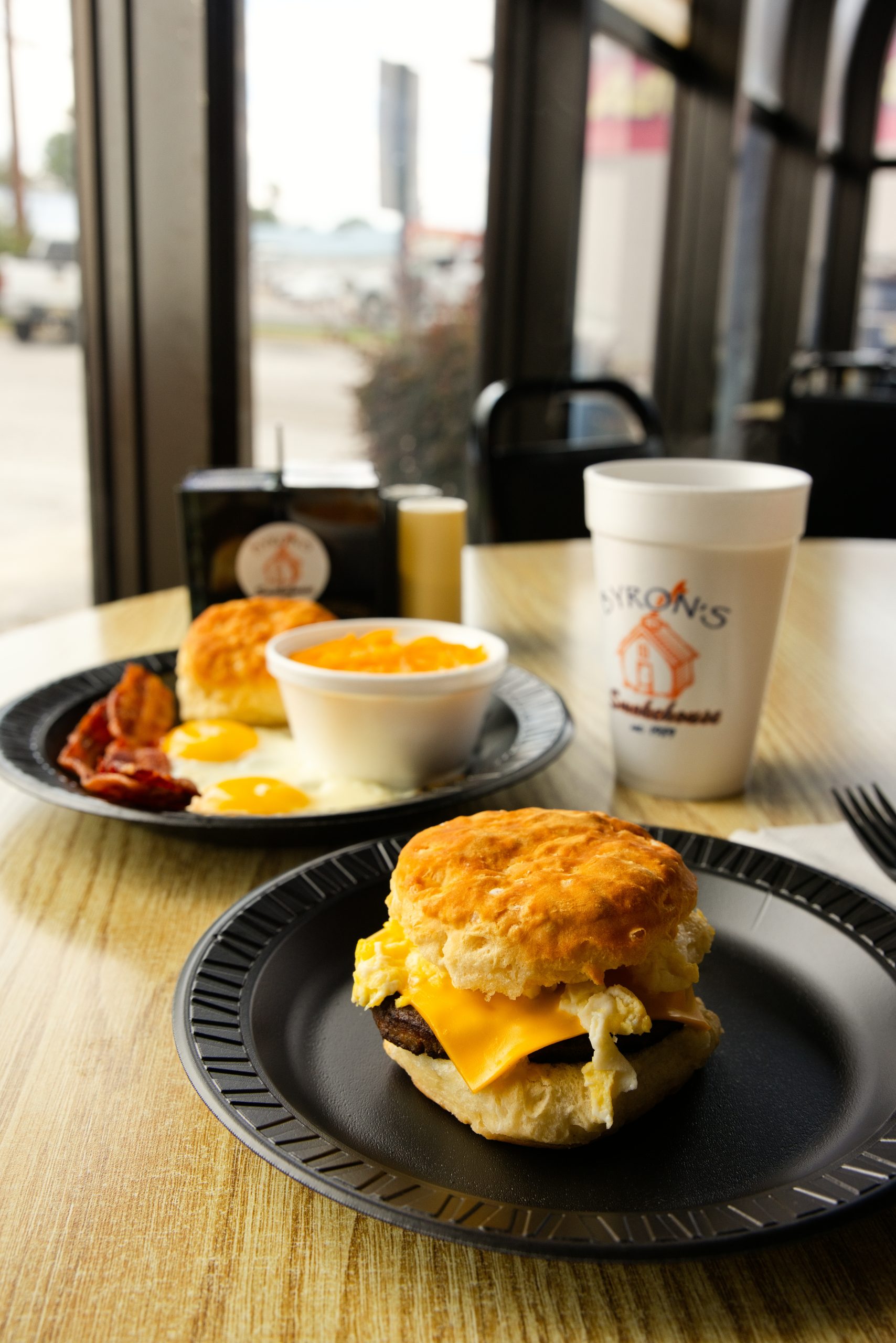 Byron's breakfast biscuit sandwich and breakfast plate